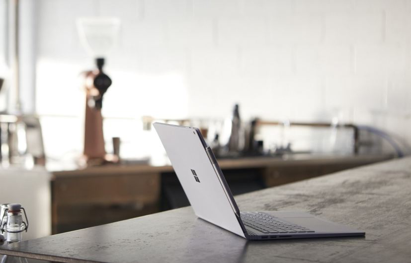 Surface Book 2 on table with background